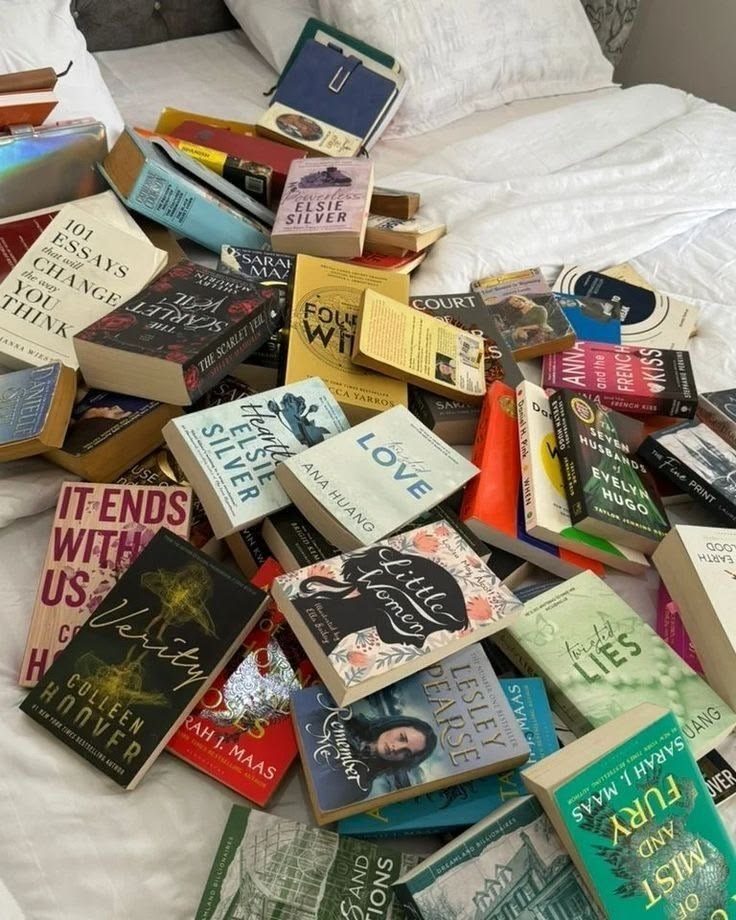 A spread of design books and printed covers